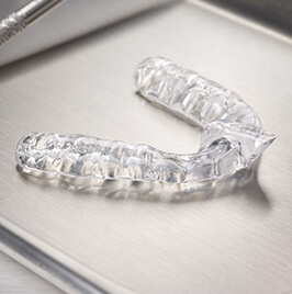 clear dental mouthguard on a table