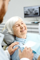 Older woman at dentist for dentures