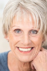 Woman with dentures smiling