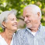 older couple smiling together 