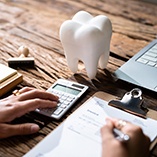 Patient calculating cost of treatment