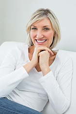 An older woman with dental implants in Park Slope