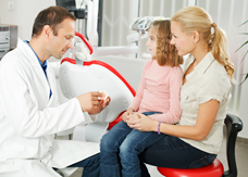 woman and child at dentist