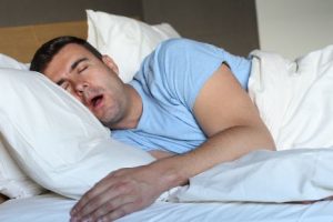 Man sleeping with his mouth open