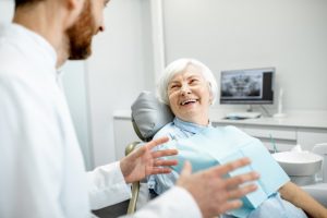 woman smiling with dentures