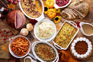 a table full of Thanksgiving food